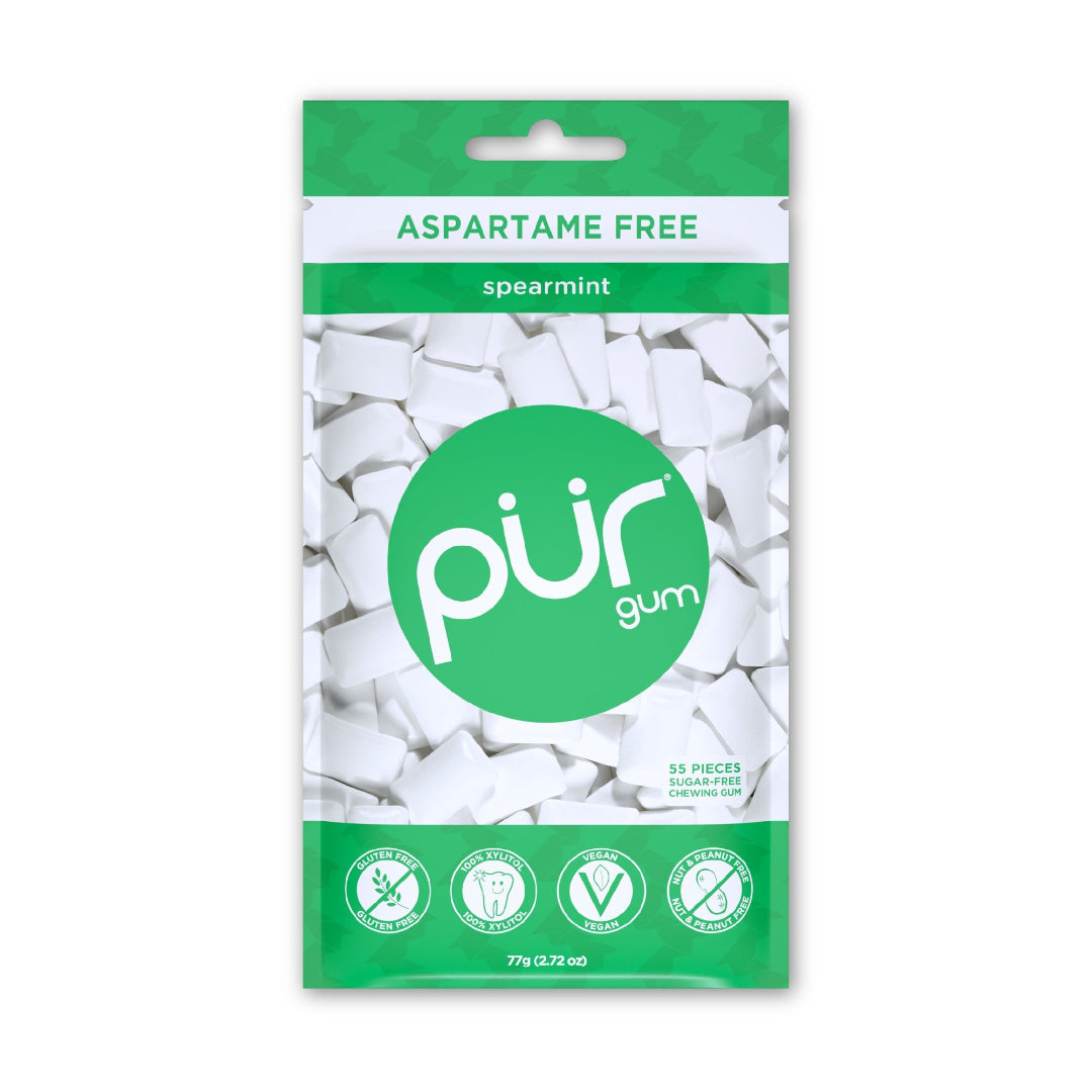 Packaging of PUR spearmint gum with green and white design on a white background
