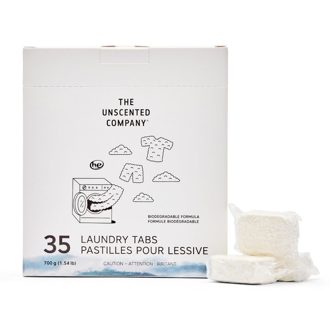 Box of The Unscented Company laundry tabs with two tabs in front on a white background