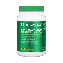 Organika magnesium supplement bottle on a green background