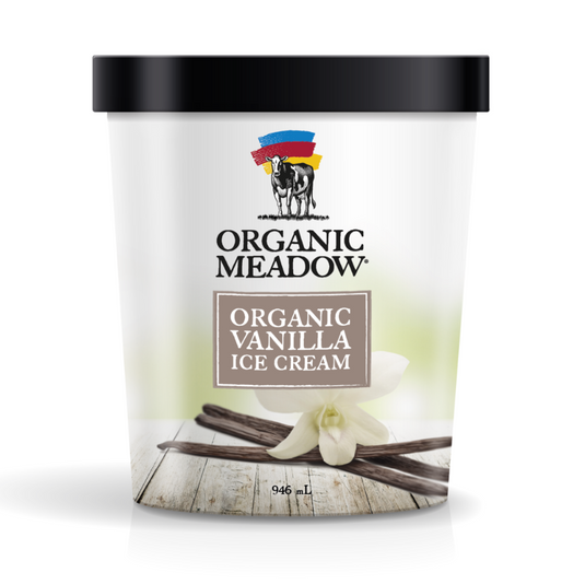 A 946 mL tub of Organic Meadow Organic Vanilla Ice Cream with a black lid and white label, featuring the brand logo and vanilla bean and flower graphics on a white background.
