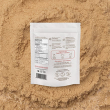 White package with nutritional information on a beige textured background