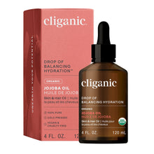 cliganic jojoba oil bottle and packaging on a white background