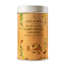Canister of Love People Curry Masala on a beige background