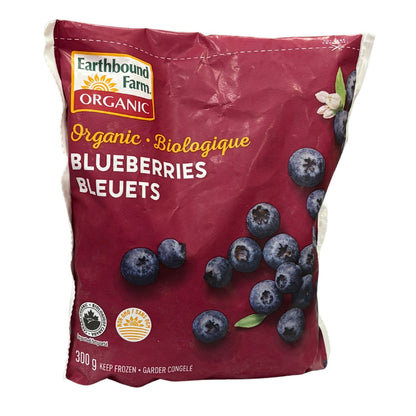 Earthbound Farm Organic Blueberries in a 300g bag, featuring a deep burgundy packaging with illustrations of fresh blueberries and the Earthbound Farm logo.
