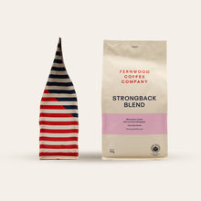 Fernwood Coffee Company Strongback Blend coffee package with a striped design on a white background