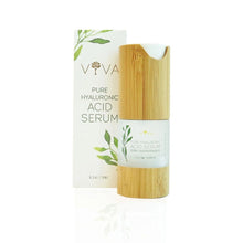A pump bottle of Viva Organics Pure Hyaluronic Acid Serum next to its packaging box, both featuring a green and white color scheme with text and branding.