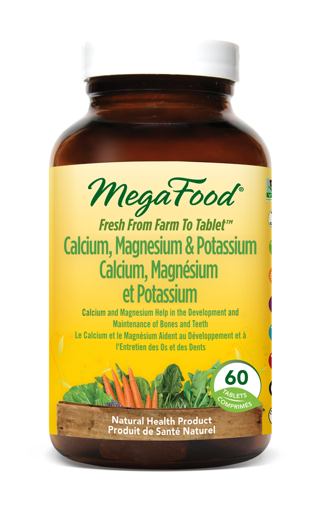 MegaFood supplement bottle with yellow label on a white background