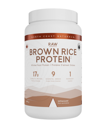A white plastic tub of North Coast Naturals Raw Brown Rice Protein powder, featuring a white label with brown text and graphics, on a solid white background.