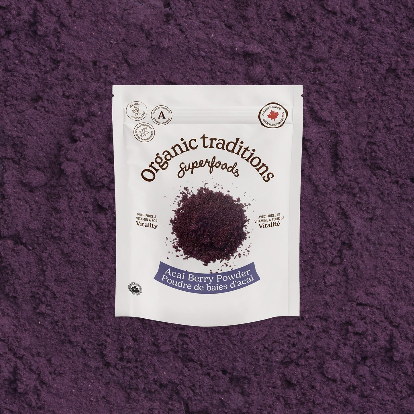 Package of Organic Traditions Acai Berry Powder on a purple textured background
