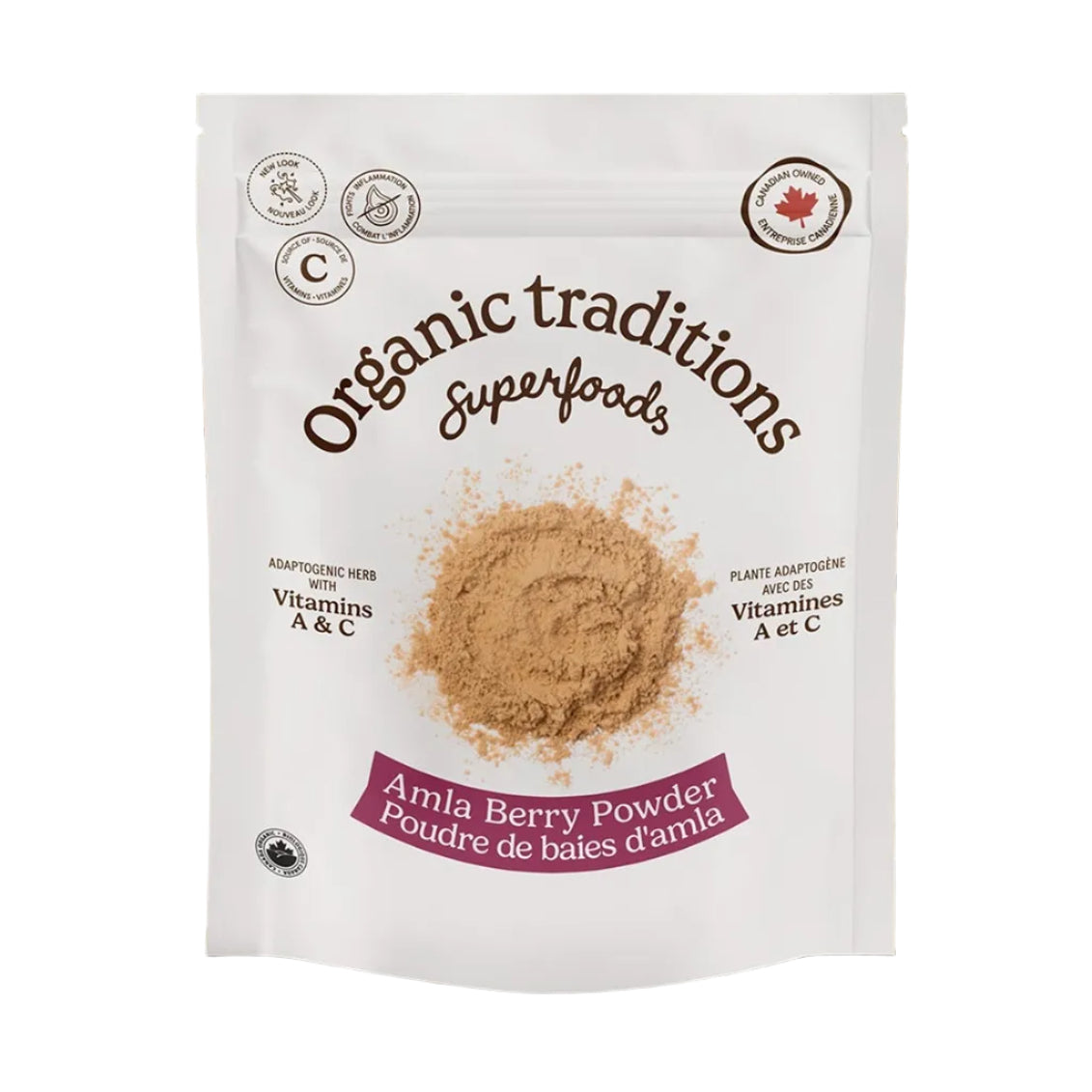 Package of Organic Traditions Amla Berry Powder on a sandy background