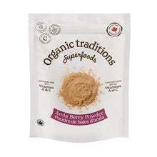 Package of Organic Traditions Amla Berry Powder on a sandy background