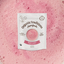 Package of Organic Traditions Beet Latte on a pink background