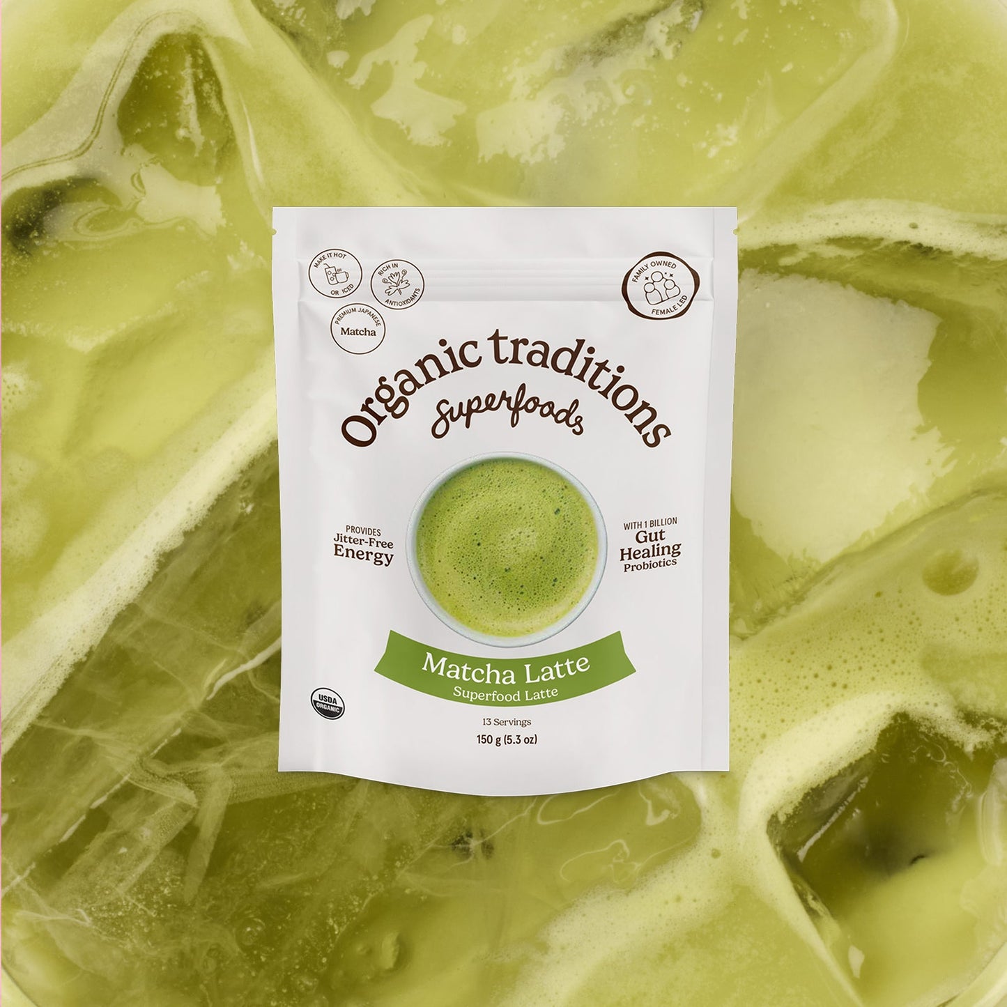 Organic traditions Matcha Latte package on a green matcha latte background