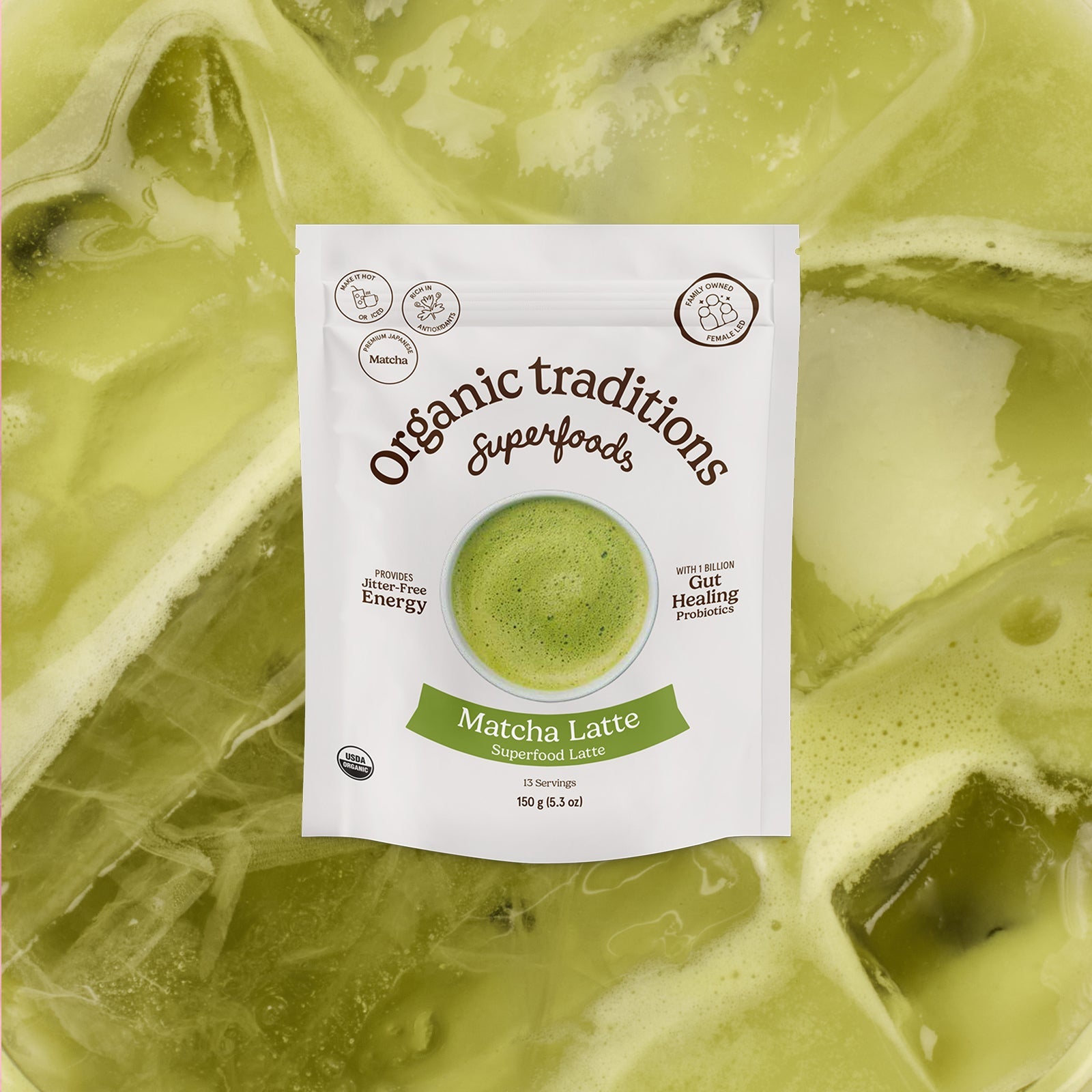 Organic traditions Matcha Latte package on a green matcha latte background