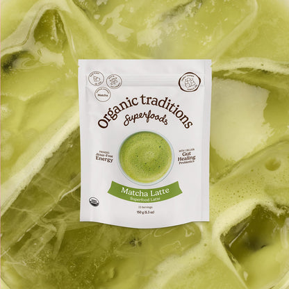 Organic traditions Matcha Latte package on a green matcha latte background