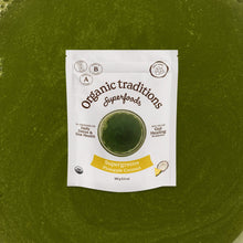 Supergreens pineapple coconut package by Organic Traditions on a green background