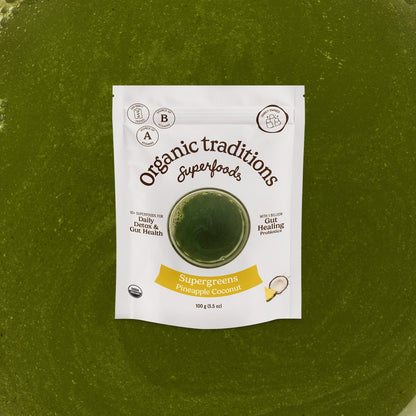 Supergreens pineapple coconut package by Organic Traditions on a green background