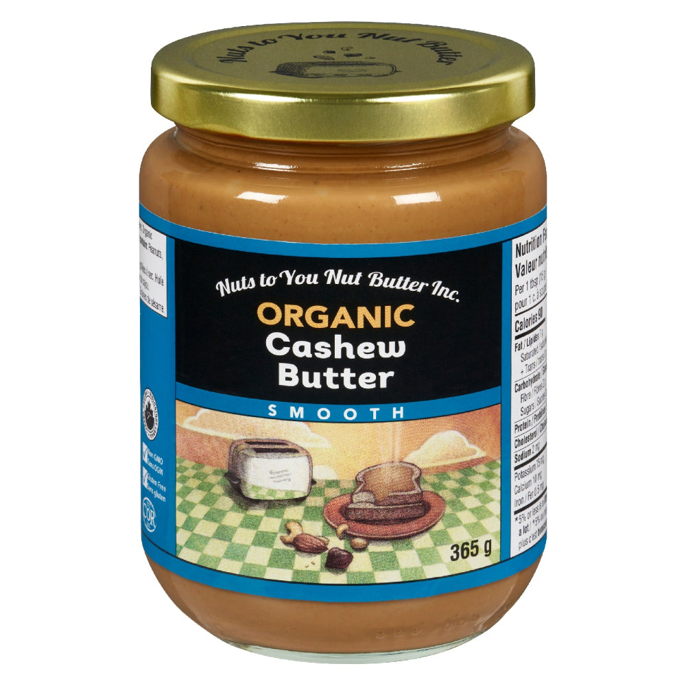 Jar of organic cashew butter with a gold lid on a white background