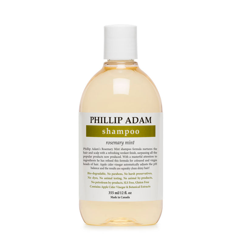 Bottle of Phillip Adam shampoo with a white label on a white background