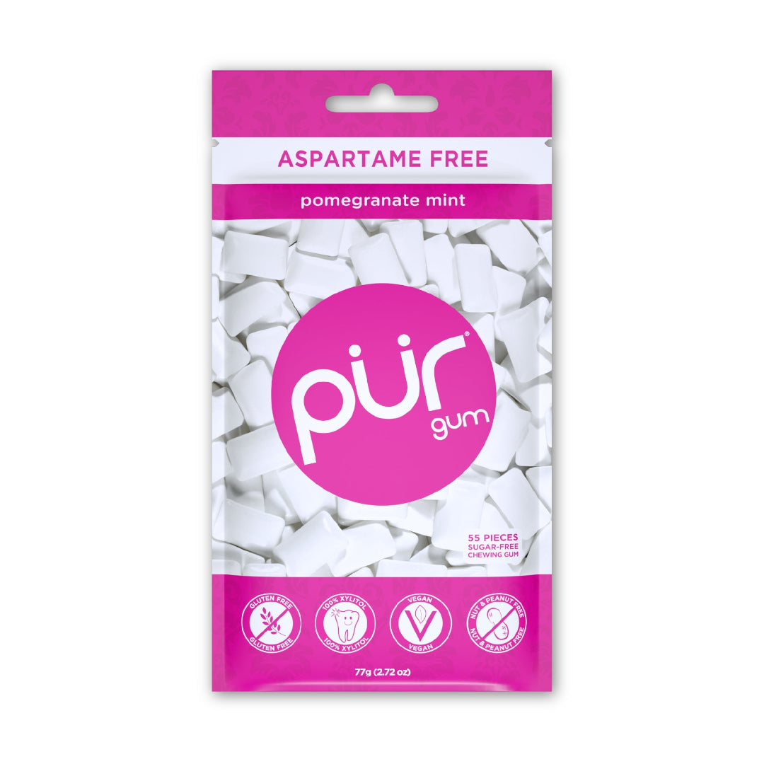 Packaging of PUR gum with pomegranate mint flavor on a white background
