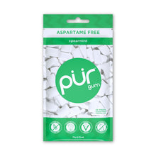 Packaging of PUR spearmint gum with green and white design on a white background