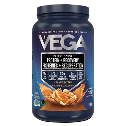 Vega protein powder container with peanut butter flavor on a black background