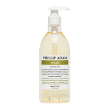 Bottle of Phillip Adam wash with a pump on a white background