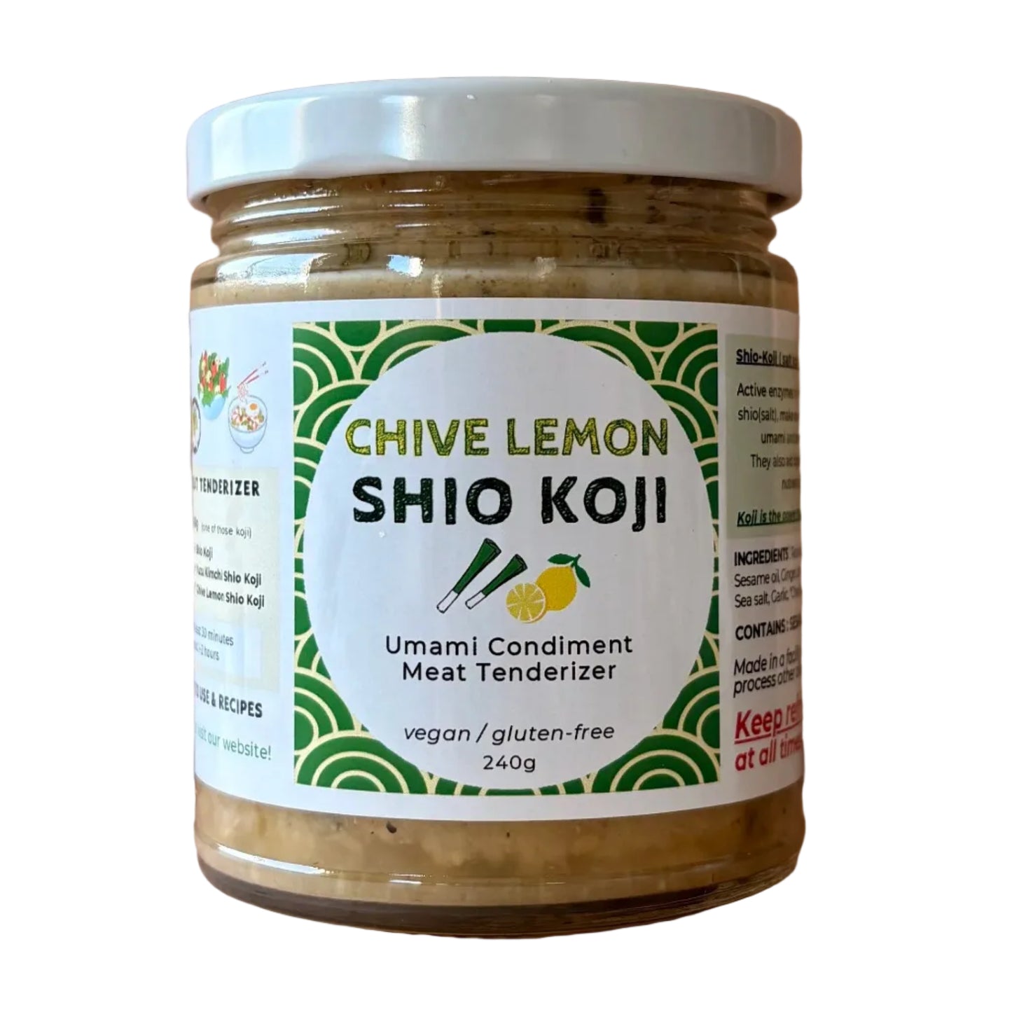 A glass jar of Chive Lemon Shio Koji umami condiment meat tenderizer, featuring a white label with green patterns and a white lid, set against a light wood plank background.