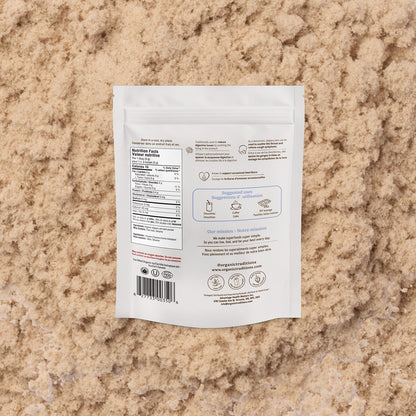 White package with text and icons on a beige textured background