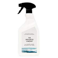 Clear spray bottle with black nozzle labeled 'The Unscented Company' on a white background