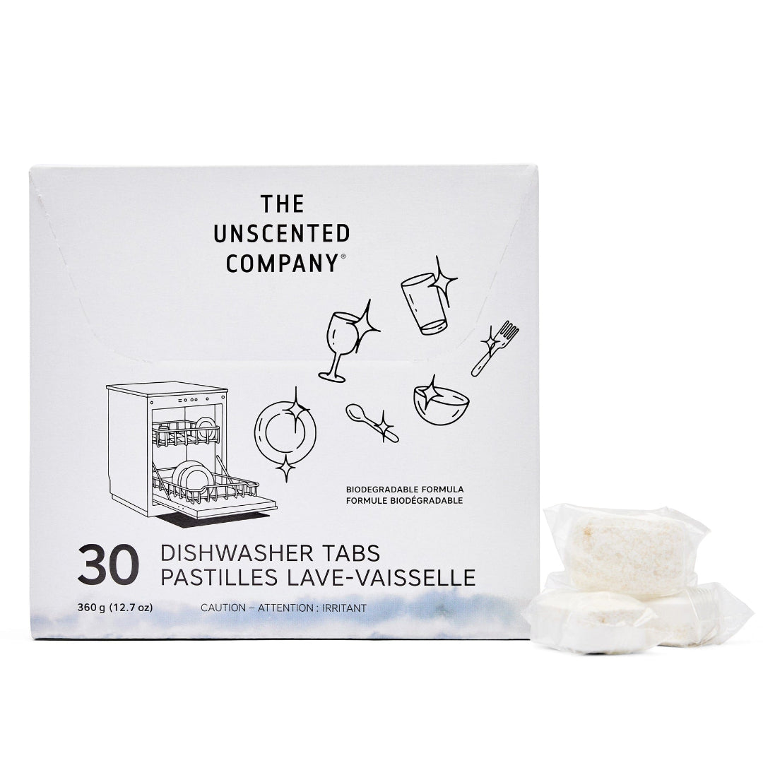 Box of The Unscented Company dishwasher tabs with some tabs displayed in front on a white background.