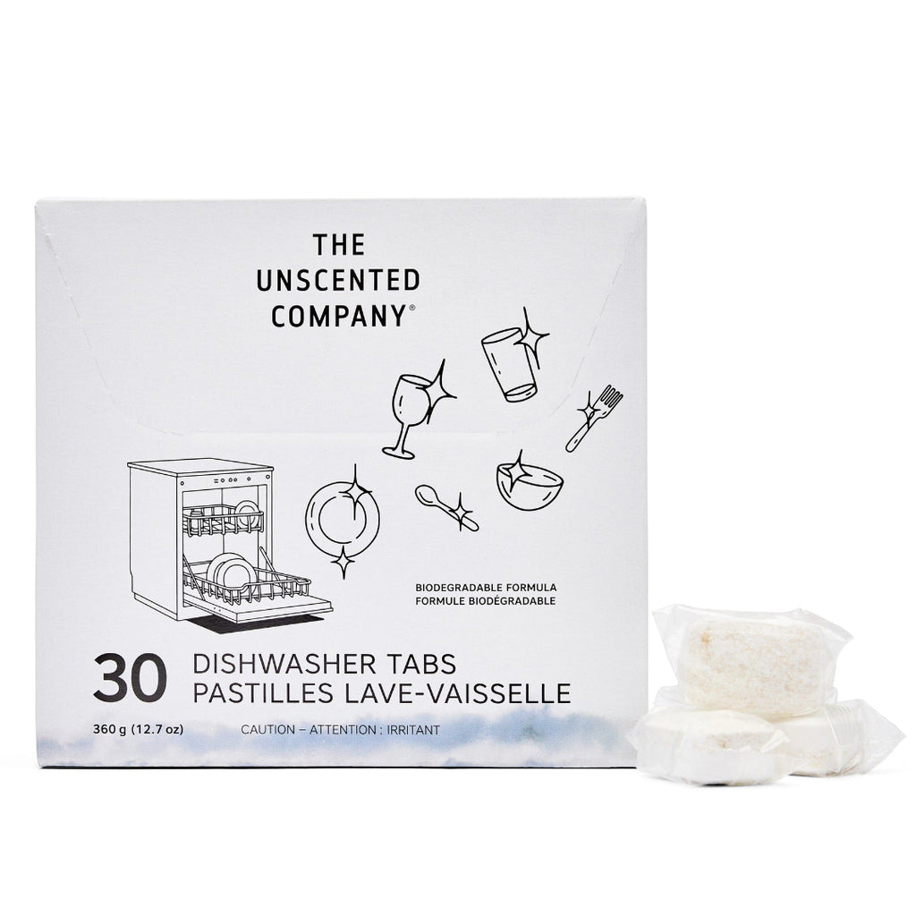 Box of The Unscented Company dishwasher tabs with some tabs displayed in front on a white background.