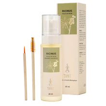 Ricinus oil bottle, applicator, and packaging on a light gray background