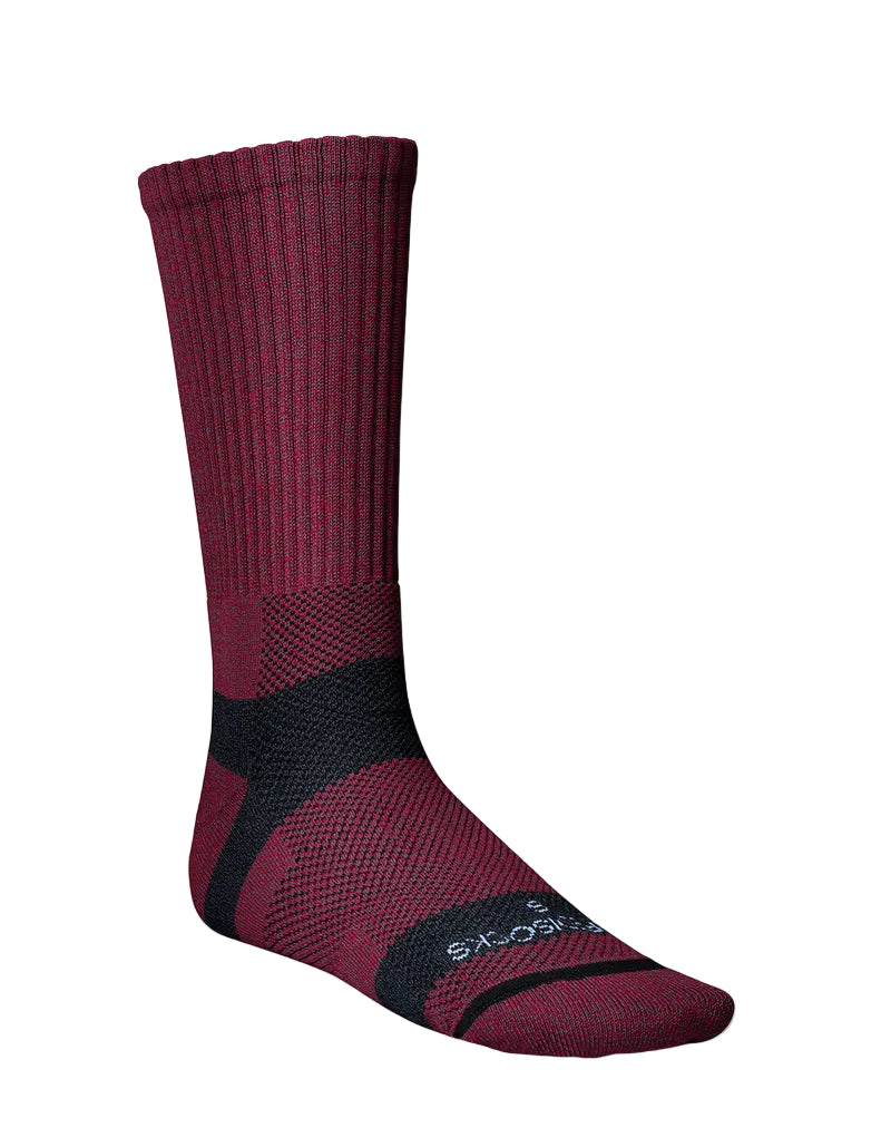 Red sock with black accents on a light gray background