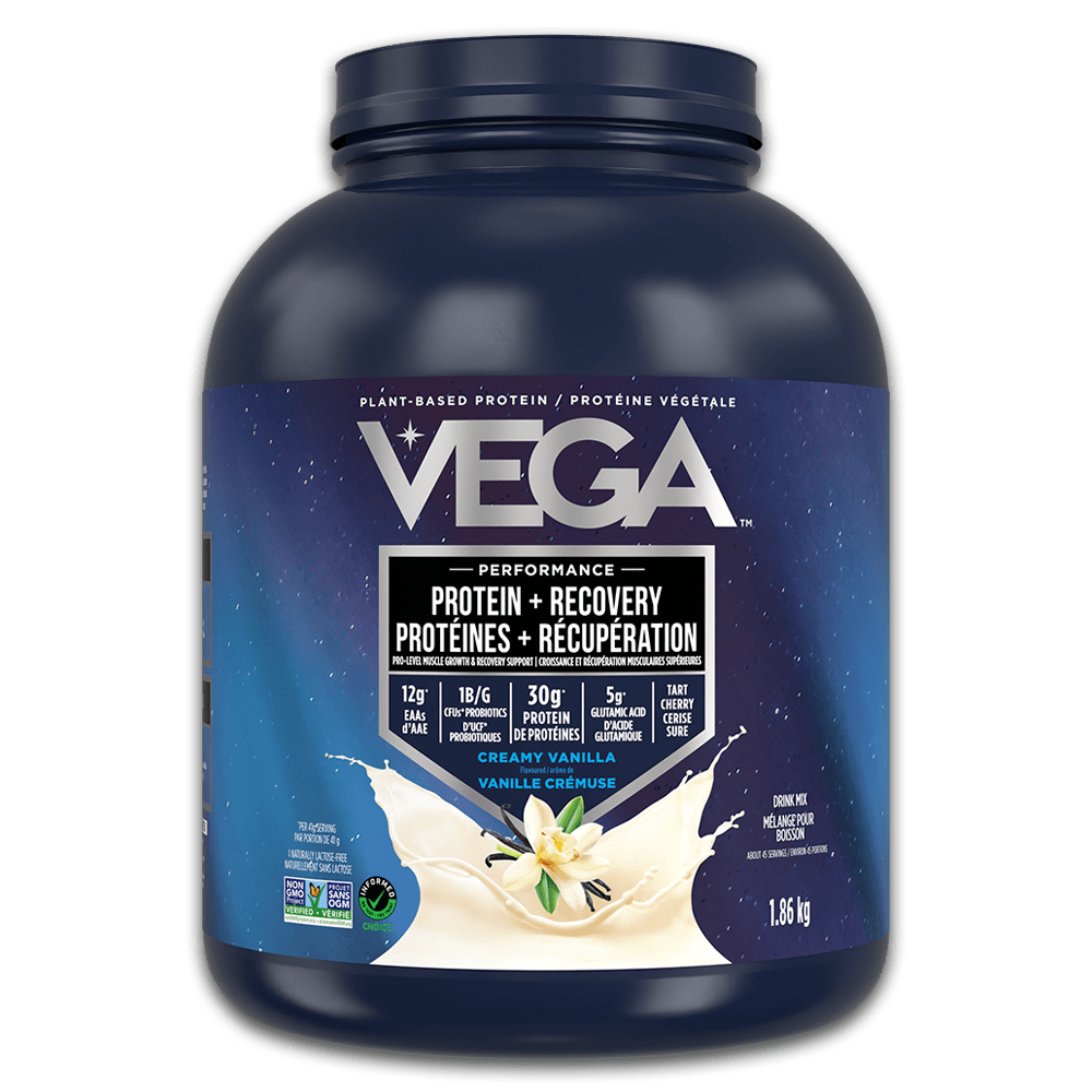Vega protein powder container with blue label on a black background