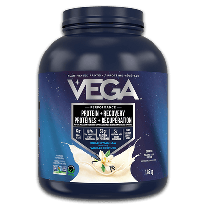 Vega protein powder container with blue label on a black background
