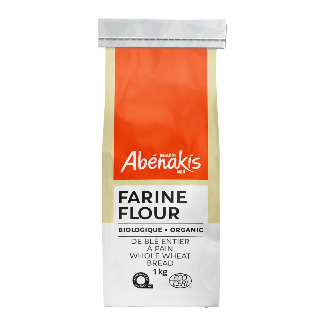 Bag of Abenakis organic whole wheat bread flour on a white background