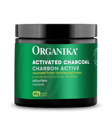 Organika activated charcoal container with green label on a white background