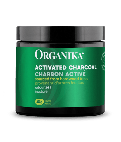 Organika activated charcoal container with green label on a white background