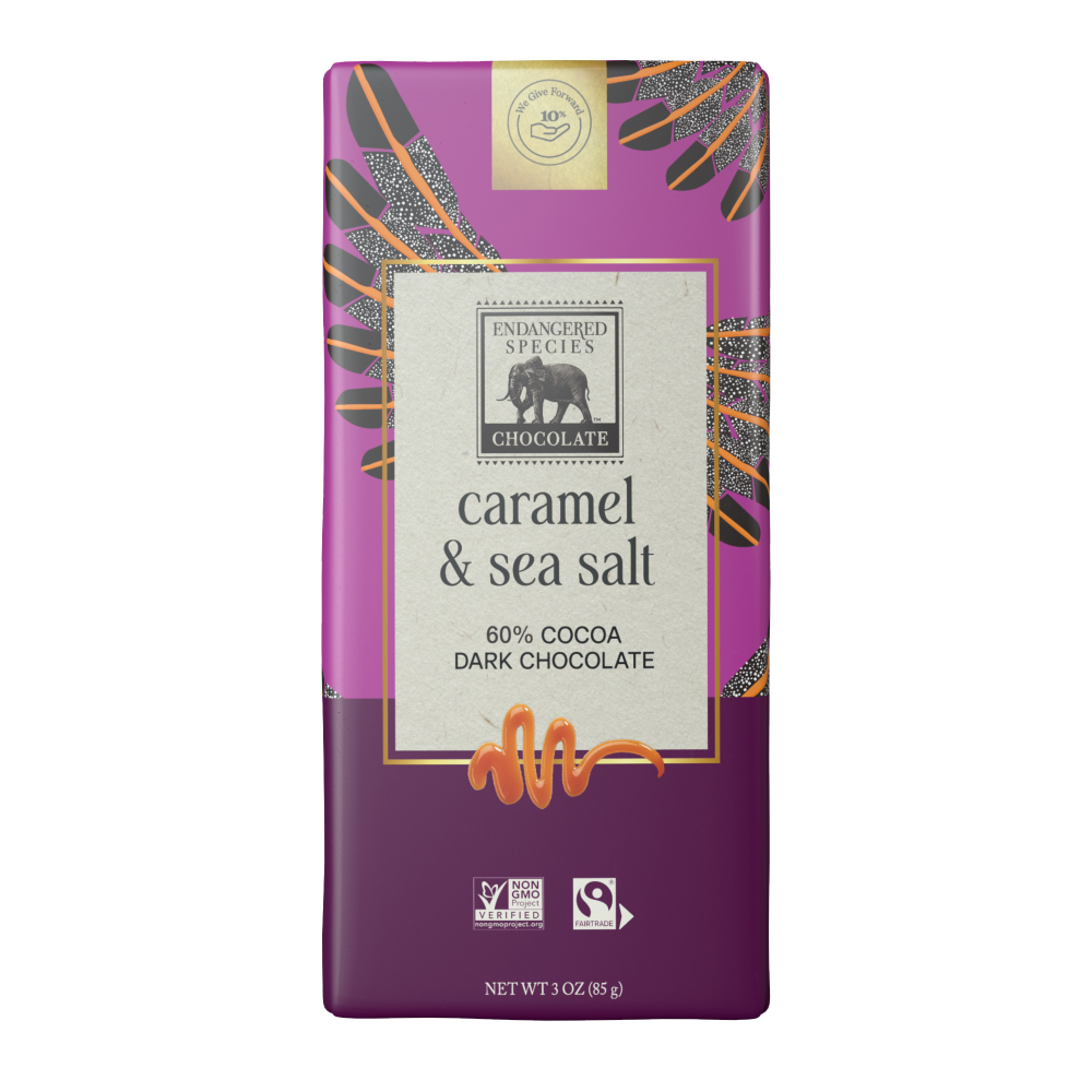 Purple packaging of caramel and sea salt dark chocolate with decorative elements on a white background