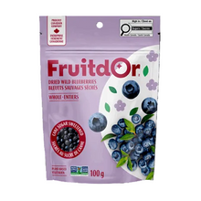 A 100g pouch of FruitdOr Dried Wild Blueberries, featuring a light purple background with illustrations of blueberries, green leaves, and a white plate graphic, set against a dark gray background.