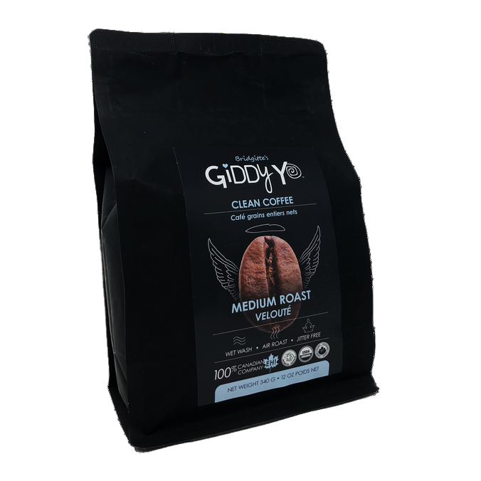 Black coffee bag with Giddy Y logo and medium roast label on a white background