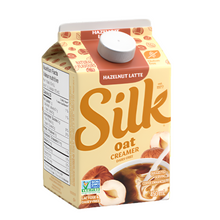 Silk oat creamer carton with hazelnut latte flavor on a white background