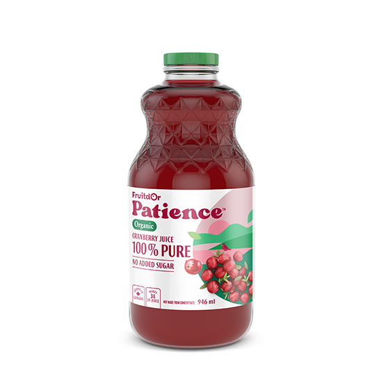 Bottle of FrutisOr Patience Organic Cranberry Juice on a white background