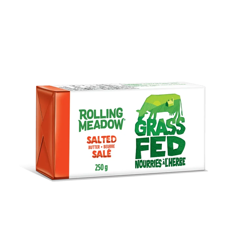 A 250g package of Rolling Meadow Grass Fed Salted Butter, featuring a white cardboard box with green and red text and a green cow logo, set against a plain white background.